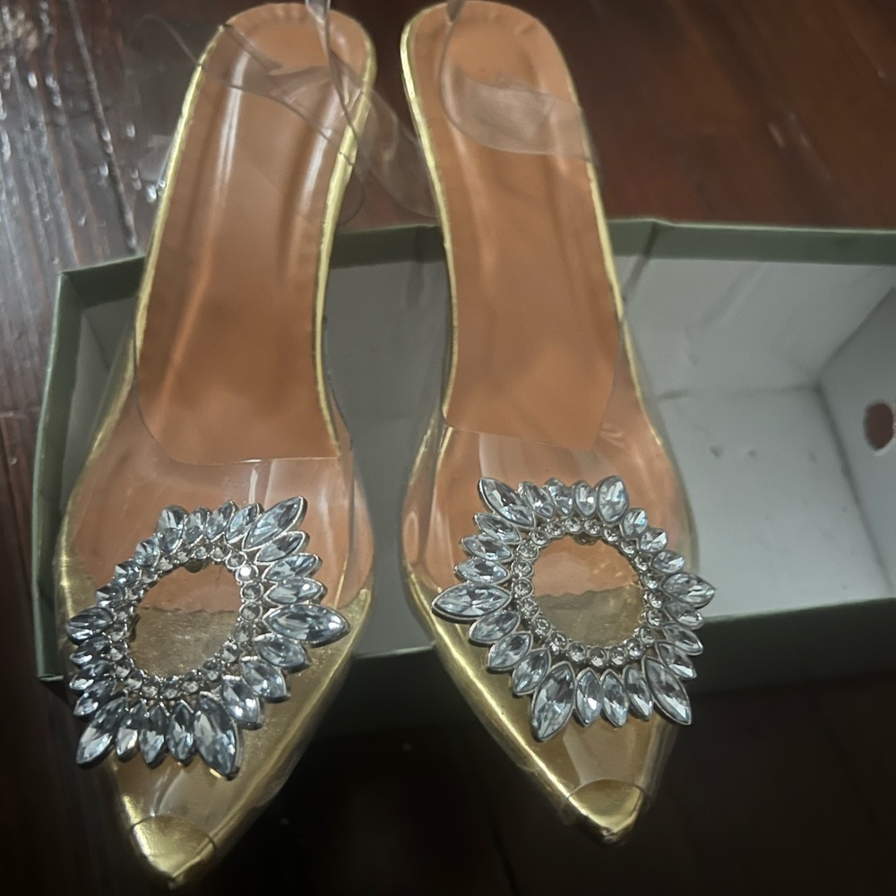 Shoes clear with jewelry on it
